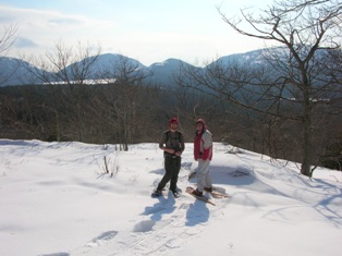 Argy and Noah Snowshoeing in Acadia